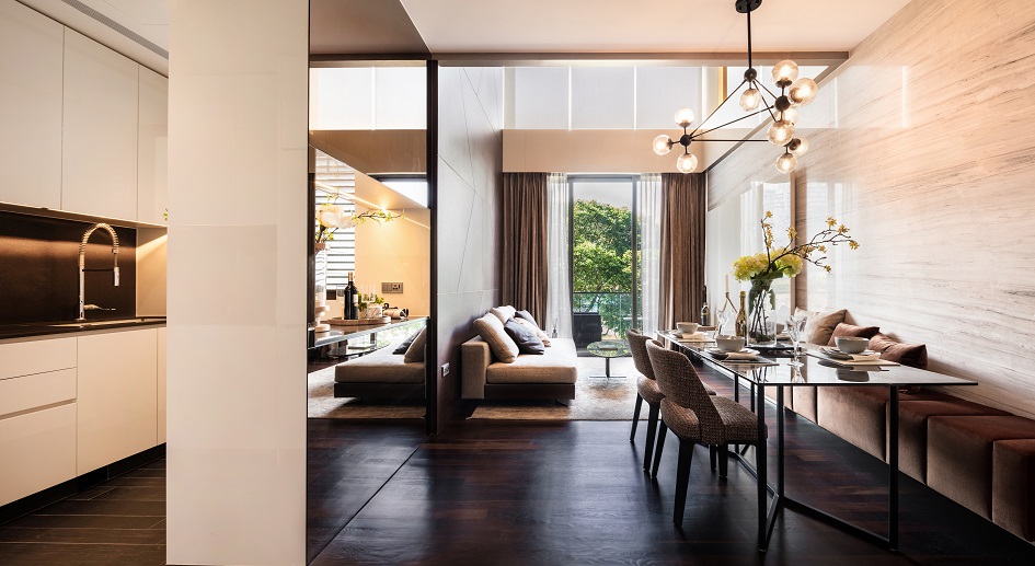 The two-bedroom-plus-study loft apartment with a double-volume ceiling in the living room at Lloyd Sixtyfive